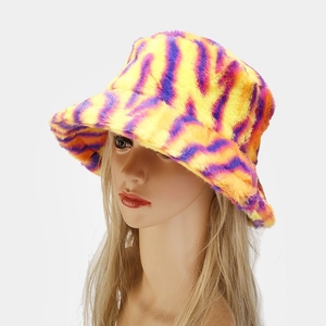 Thick plush bucket hat with vibrant yellow, purple and orange patterns for winter