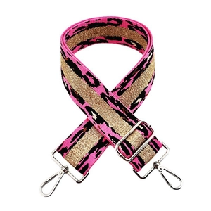 Detailed view of 5cm wide pink leopard strap with gold thread and silver metal buckles