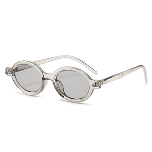 Retro oval sunglasses with transparent grey frames and dark grey lenses on white background