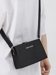 Matte black box crossbody bag for men and women with white CONE KNOWS letter printing