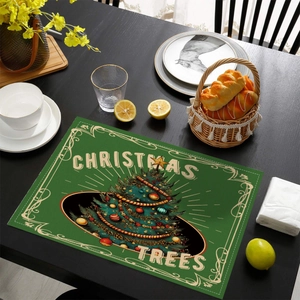 Christmas tree print green table mat placed on a black wooden dining table setting