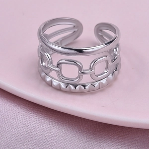 Detailed close-up of a layered 304 stainless steel ring with square chain textures