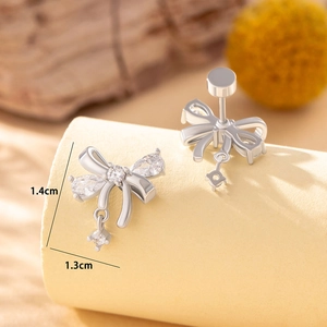 Elegant silver bow stud earrings with sparkling cubic zirconia measuring 1.4cm by 1.3cm