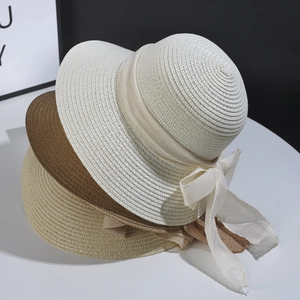 Summer foldable straw sun hats for women in white, brown and beige with chiffon bows