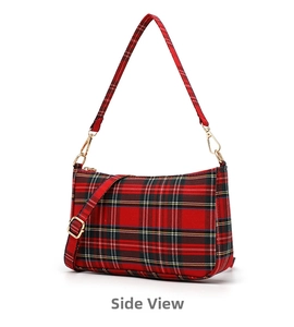 Side view of red plaid baguette bag with adjustable strap and gold metal hardware