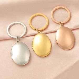Macro view of three oval 316L stainless steel lockets in silver, gold, and rose gold
