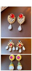 Detail of vintage gold plated earrings with water drop pearls and colorful gemstones