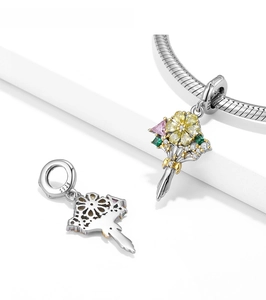 Macro detail of S925 sterling silver bouquet charm with colorful zircon stones on chain