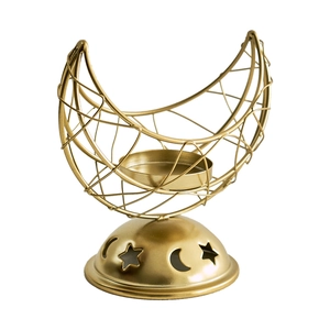 Golden crescent moon metal incense burner with hollow star patterns and a steady base