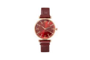 Close-up of red sunray dial with Roman numerals and magnetic Milanese mesh strap