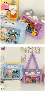 Detail of plush ita bag with large PVC window for displaying anime pins and collectibles