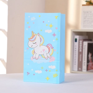 Sky blue kraft paper gift bag featuring a cute cartoon unicorn and stars for kids