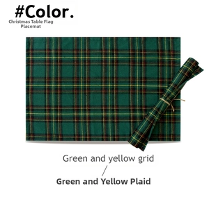 Macro detail of woven green and yellow grid placemat for Christmas table decoration