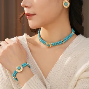 Vintage bohemian jewelry set with turquoise beads, floral gold accents and crystals
