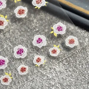 Adesivi per unghie con rose acquerello e scritte bianche su pellicola PET ultra sottile