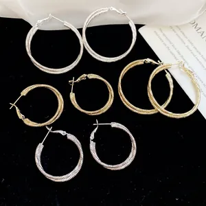 Chic silver needle twisted hoop earrings set with gold and silver woven textures