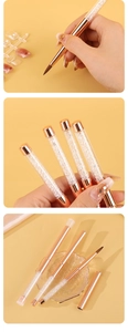 Detail of crystal handle nail art brushes with rose gold metal ferrules and fine tips