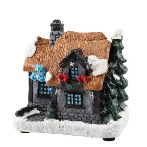 Luminous Christmas resin cottage miniature with snowy trees and warm LED lighting ornament
