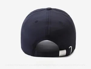 Rear view of deep blue baseball cap showing adjustable strap and matte metal buckle