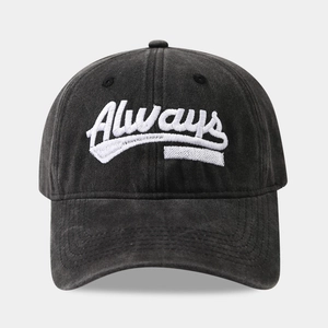 Close-up of Always 3D embroidery on vintage washed black cotton baseball cap fabric