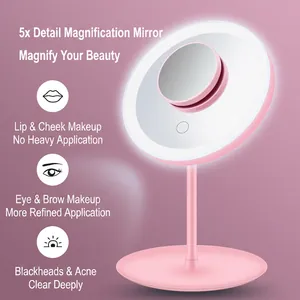 Pink portable LED makeup mirror with ring light and 5x magnification detail mirror