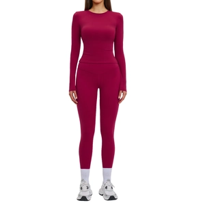Women's burgundy slim-fit yoga set with long-sleeve top and high-waist leggings