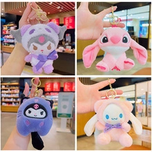 Detailed view of plush Kuromi and Cinnamoroll keychain charms with gold metal clips