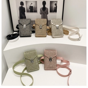Selection of five studded crossbody bags in black, khaki, beige, green, and pink colors