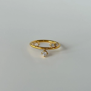 Minimalist 18k gold plated ring featuring a delicate snowflake zircon dangling pendant