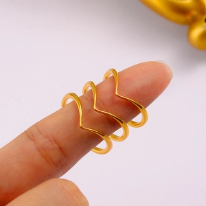 Minimalist gold stacked wave rings in stainless steel for women with polished finish