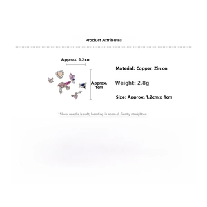 Macro shot of heart and butterfly stud earrings with dimensions and material specs