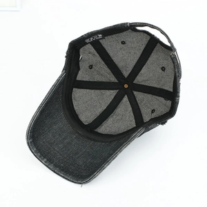 Retro washed denim baseball cap made of 100% cotton showing interior label and structure