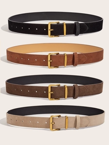 Vertical stack of matte leather belts in black, caramel, coffee, and beige with gold buckles