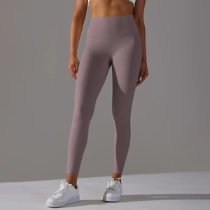 Macro detail of high-waist lilac yoga leggings showing brushed matte fabric and seamless fit