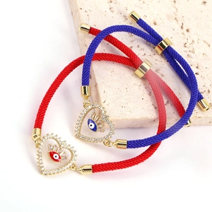 Adjustable evil eye heart bracelets with cubic zirconia in red and blue cord styles
