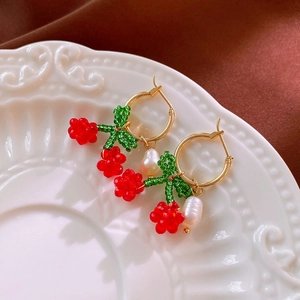Handmade cherry beaded hoop earrings with red beads, green leaves and baroque pearl