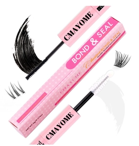 Close-up of pink dual-ended lash bond and seal glue with spiral brush and clear sealant