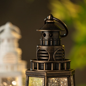 Lanterna musicale a faro vintage con finitura in bronzo ed effetto luminoso a LED