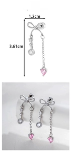 Detail view of bowknot chain earrings with pink heart zircon and 3.61cm length dimensions
