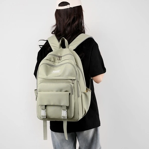 Zaino scolastico verde chiaro grande capacità con tasche multiple ed etichetta moda