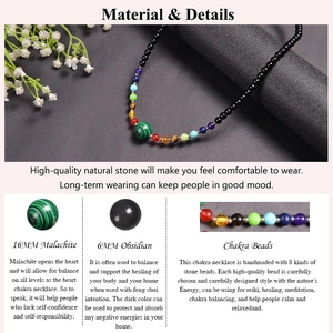 Detail of 6mm obsidian beads and 16mm malachite pendant on a chakra healing necklace