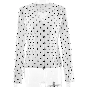 Elegant white V-neck long sleeve blouse with black polka dots and button front detail