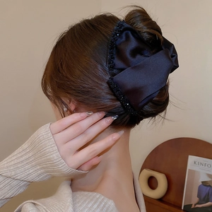 Elegant black satin ribbon hair claw clip with beaded trim for stylish women updos