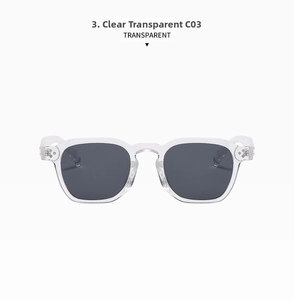 Detail view of vintage square transparent eyewear frame with silver rivet decorations