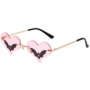 Gothic bat heart-shaped sunglasses with pink lenses and gold metal frames for parties