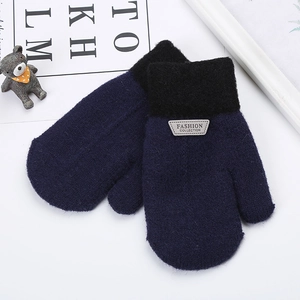 Detail of color-block striped knitted mittens for children with thick thermal lining