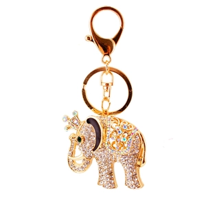 Golden elephant keychain encrusted with rhinestones featuring a crown detail