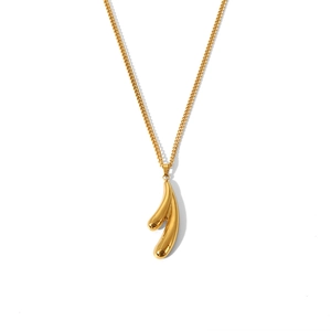 Close-up of elegant gold stainless steel teardrop heart pendant with a polished finish