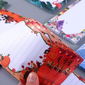 Magnetic notepad with autumn pumpkin theme and maple leaf illustrations on paper
