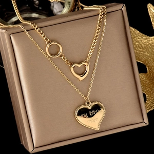 Double-layer gold stainless steel necklace with heart pendants and love you more engraving